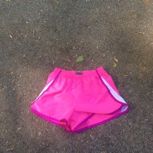 Pink and purple running shorts