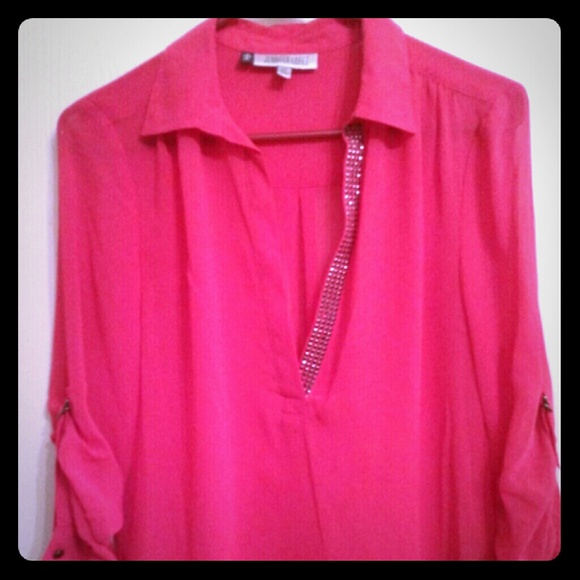 JLO pink top. Versatile sleeves can be up or down.