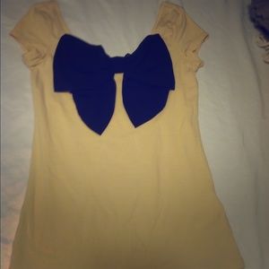 NUDE SHIRT WITH BLACK BOW DETAIL
