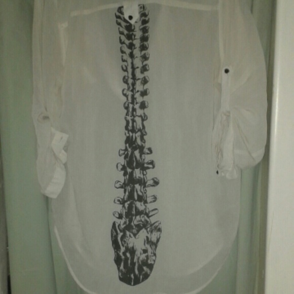 White shirt with snake spine on back