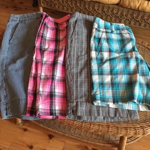 4 pair of NY & Co walking shorts.