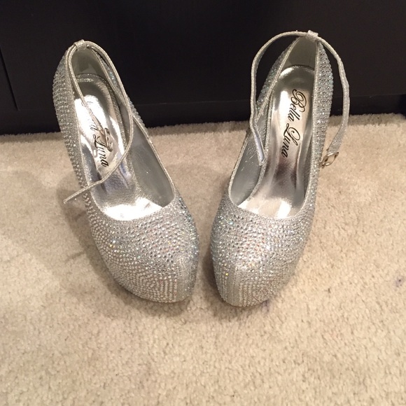 Silver rhinestoned pumps.