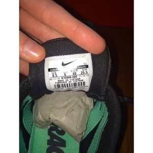 mint green Nike cleats