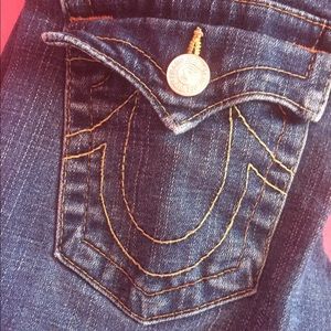 True Religion, dark denim jeans.