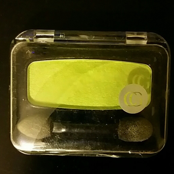 Neon green eye shadow.