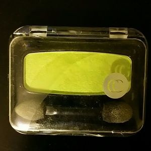 Neon green eye shadow.