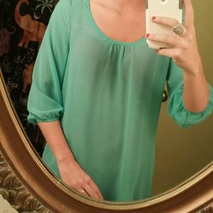 A teal see threw shirt!