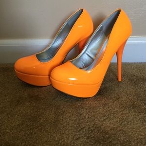 Neon orange heels