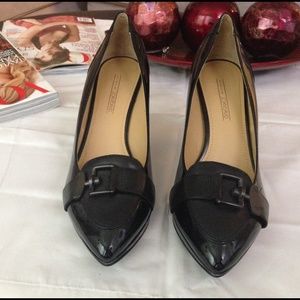Circa Joan & David black pumps with front buckle.