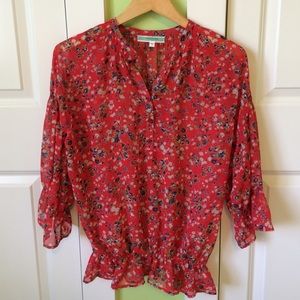 Red floral blouse