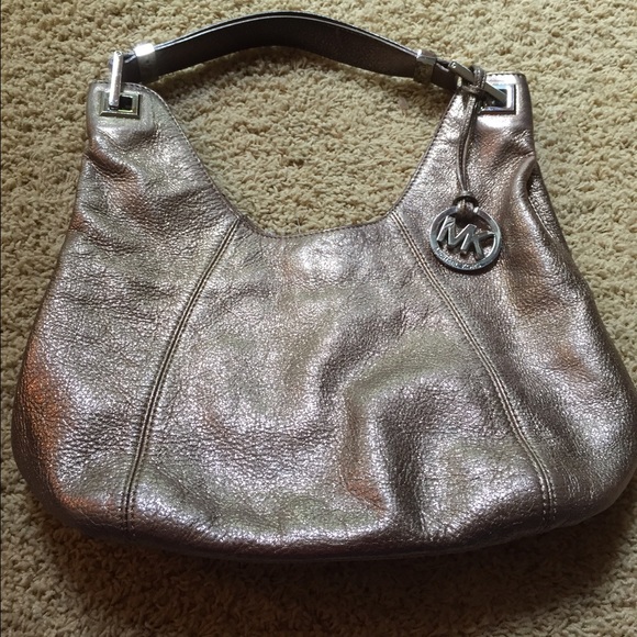 Michael Kors gold purse (sale for @cbowlin)
