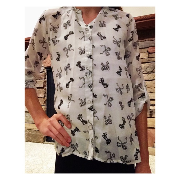 Bow button up shirt.