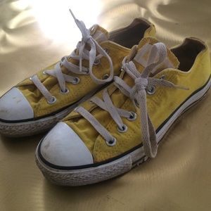 Low top yellow chucks