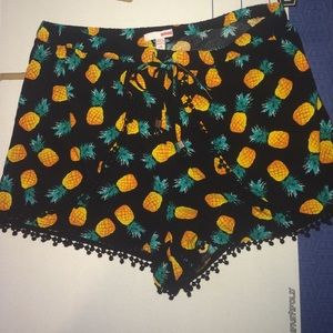 black with pineapples shorts