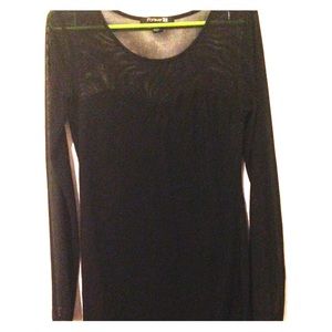 Black dress with sheer neck line and sleeves