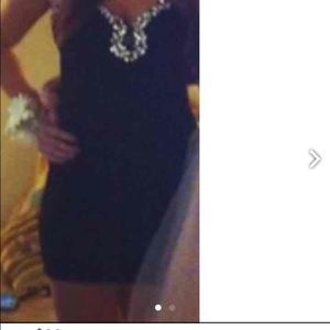 Form fitting tight black dress