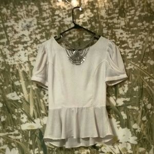 Cream peplum top