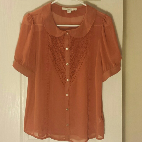 Pumpkin colored blouse