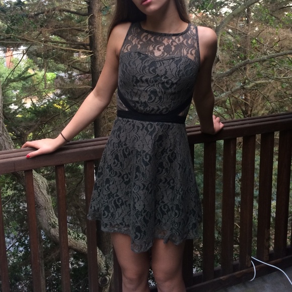 Forest green lace dress with cut outs. - Picture 1 of 3
