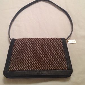 The Sak by Elliot Lucca small clutch