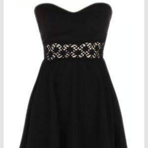 black dress with flower cut out