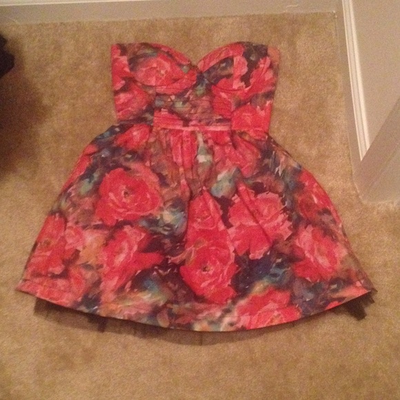 Fitted at the top and a little poof at the bottom.