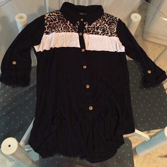 Black leopard cream colored shirt