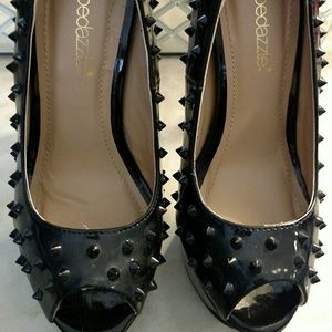Shoe dazzle spike open toe heels.