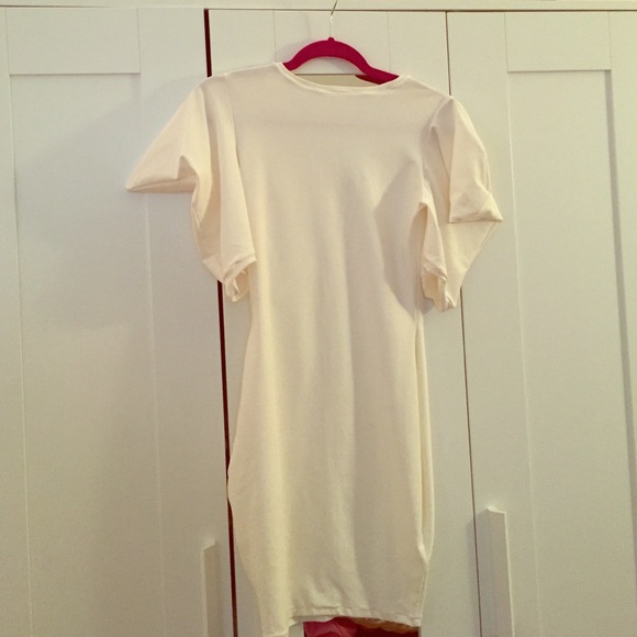 Custom white fitted party dress.