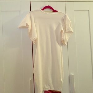 Custom white fitted party dress.