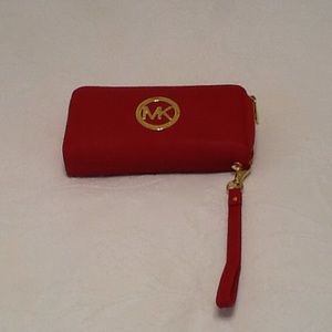 Large red wallet with wristlets trap