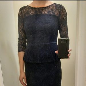 Knee-length navy blue peplum lace dress