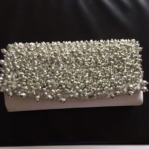 New never used silver beaded Nina clutch
