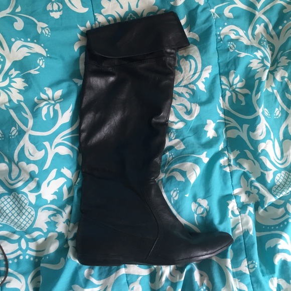 Knee high black leather boots