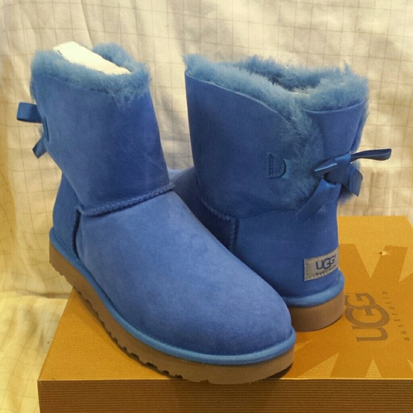 Sold.  Ugg mini bailey bow blue snow boots 10