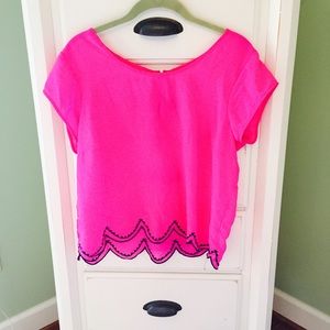 Neon pink top with navy scallop detail