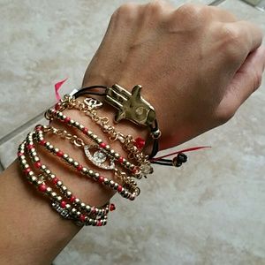 Red gold beaded evil eye and Hamza bracelet