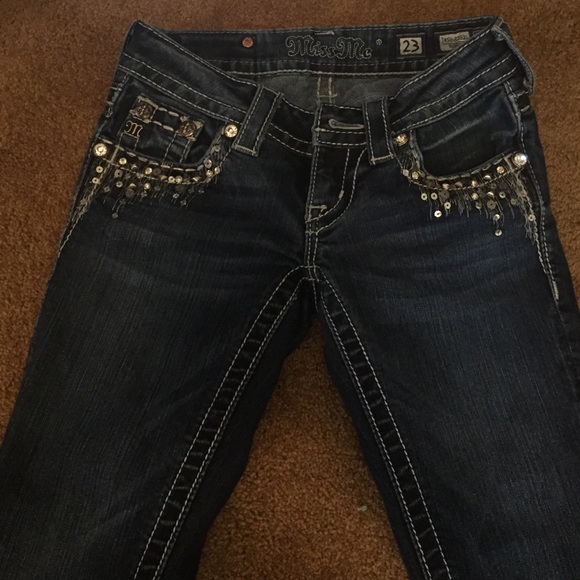 Darker washed miss me jeans