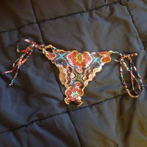 Cheeky swim suit bottoms with scrunch on bottom.