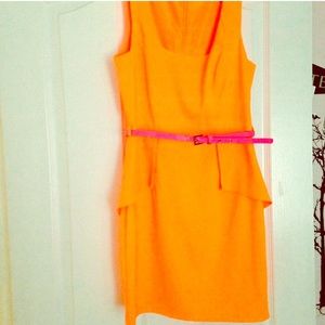 Dress neon orange with neon pink belt