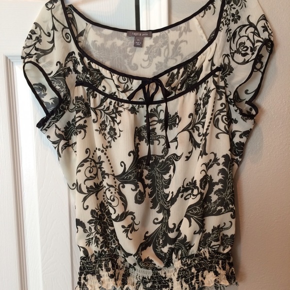 Sheer cream/black blouse