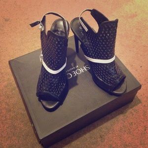 Black and white heels, only worn a couple times.