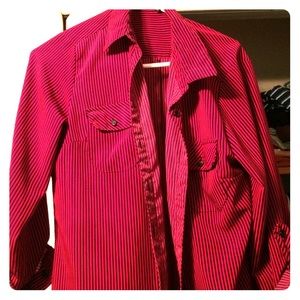 it's a button down that is a fuchsia color.