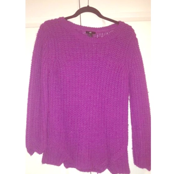 A pink sweater.