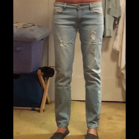 Pale blue skinny distressed jeans