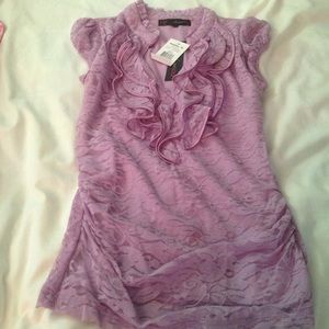 A short sleeve lavender blouse