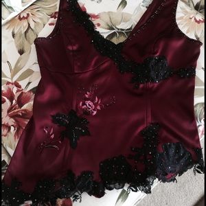 Asymmetrical fancy zippered party top.