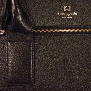 Kate Spade purse, like new with duster bag.