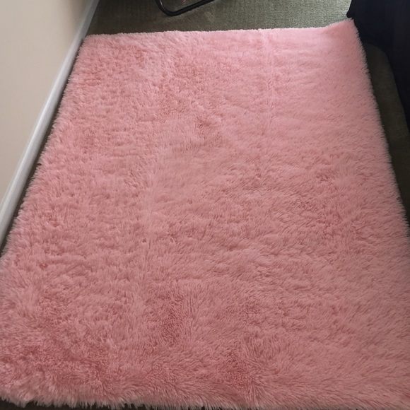 Baby pink furry rug