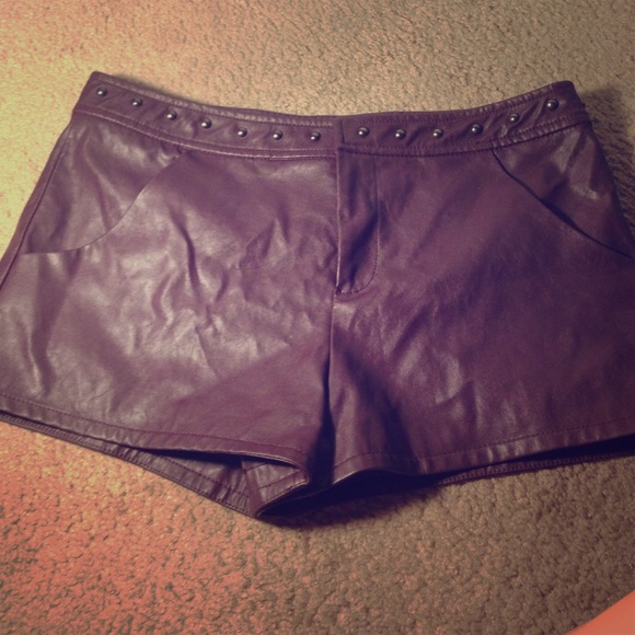 Burgundy studded leather shorts